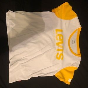 A Levi’s white and yellow shirt